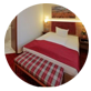 Einzelzimmerbett als Symbol für ein Einzelzimmer